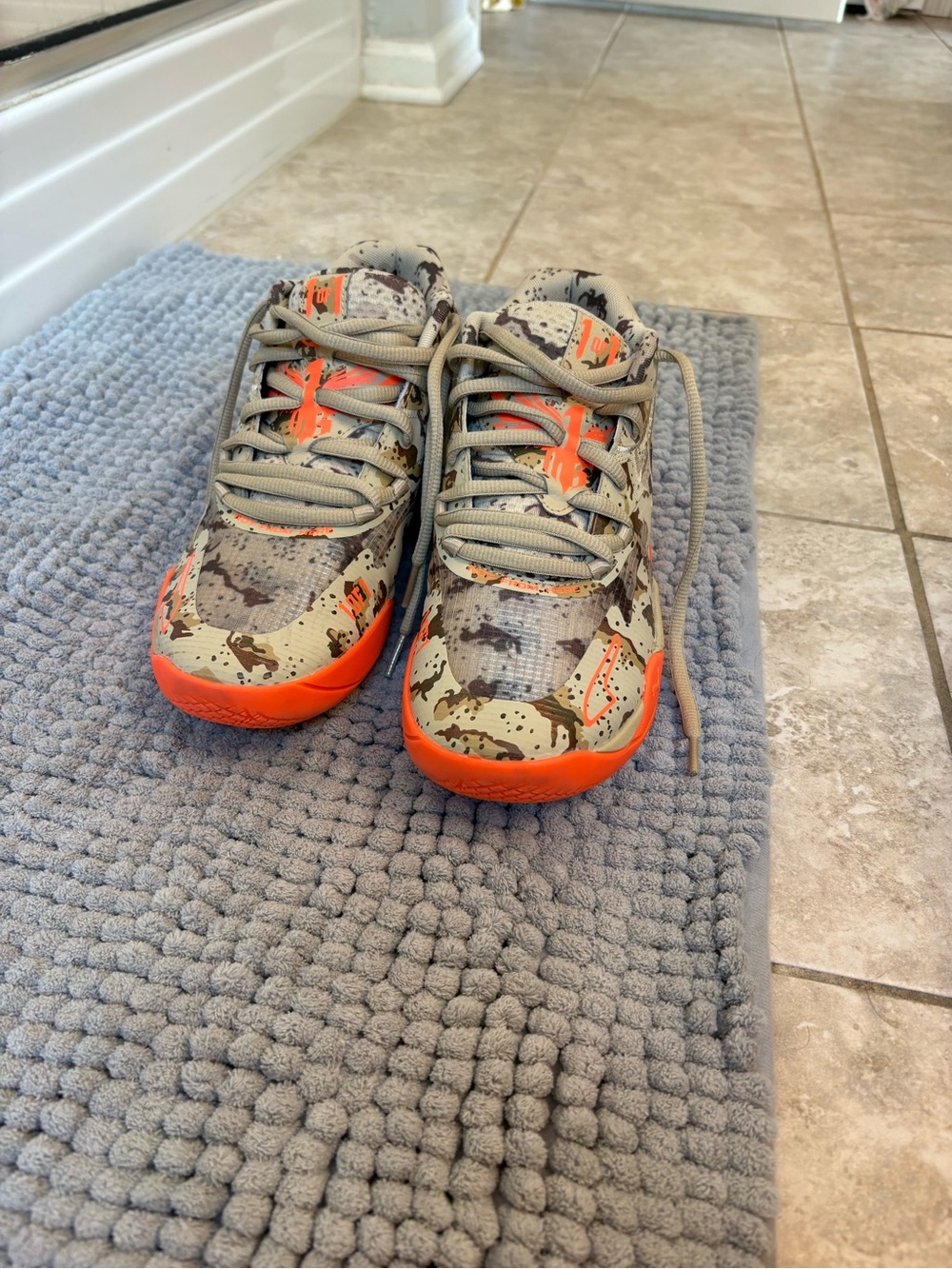 Puma Kids Camo Sneakers with Bright Orange Accents